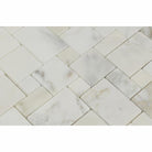 Close-up of Calacatta Gold marble showing rich veining and polished surface
