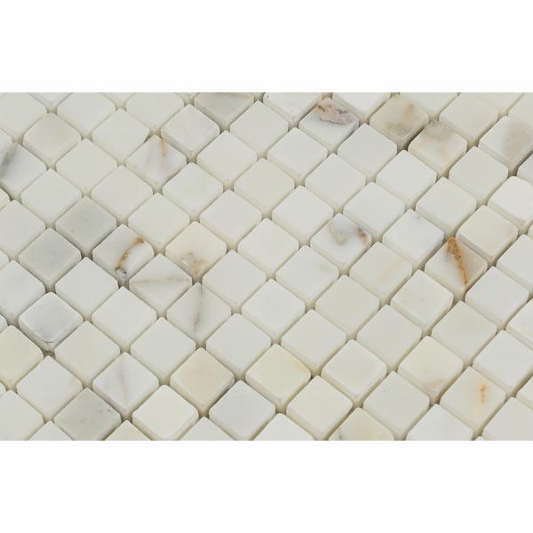 Close-up of Calacatta Gold Marble mini square mosaic pattern and polished surface