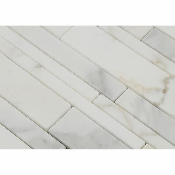Close-up of Calacatta Gold strip mosaic showing linear pattern and gold veining