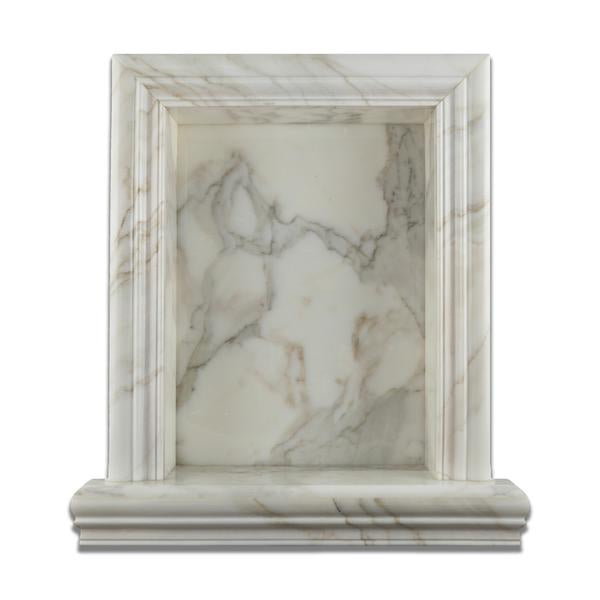 Close-up of Calacatta Gold veining detail on shampoo niche edge