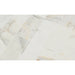 Close-up showing chiseled texture and golden veining of Calacatta Gold Splitface Marble