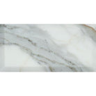 Close-up of 3x6 Calacatta Gold tile with beveled edge and veining details