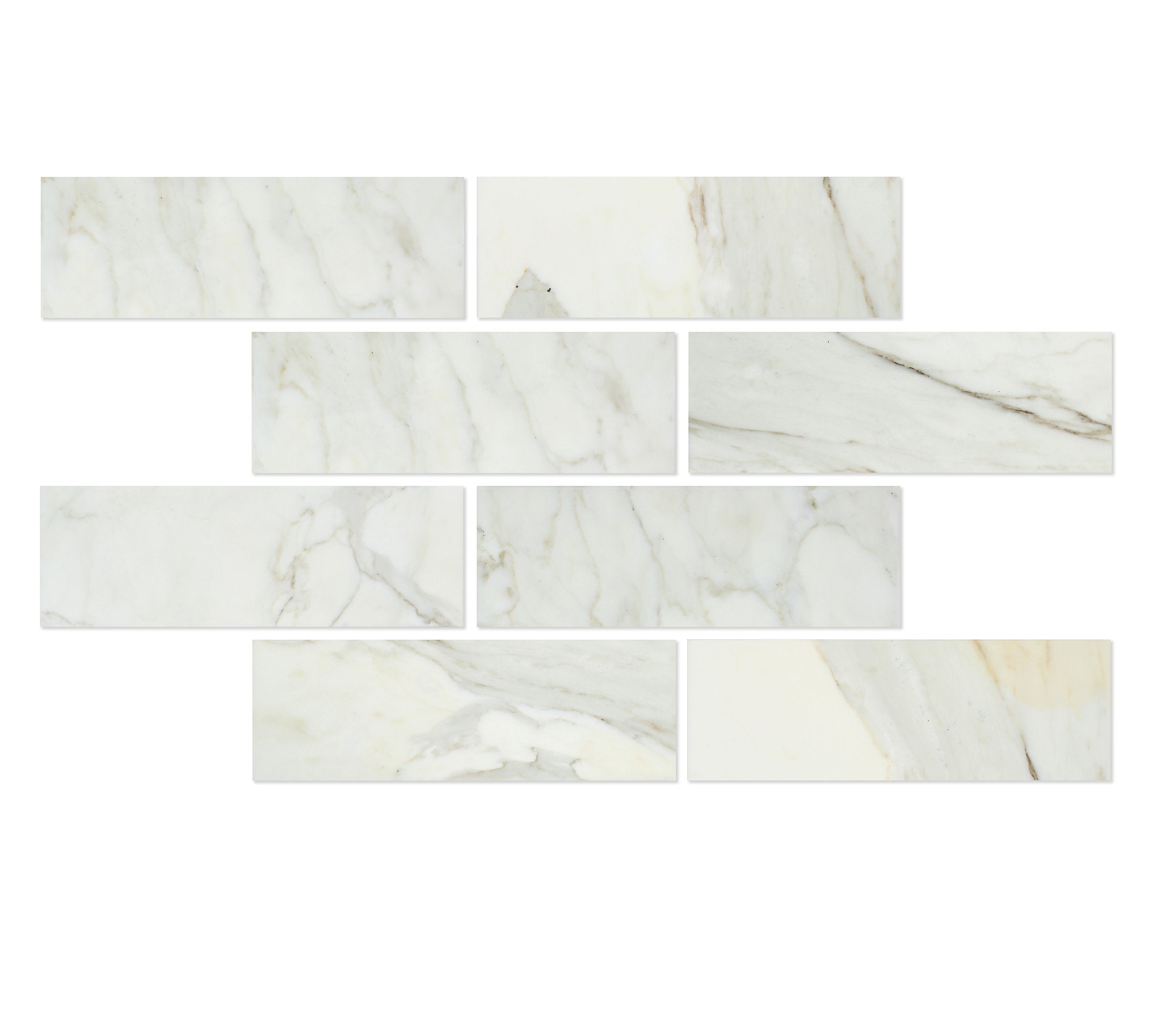 Close-up of Calacatta Gold 4x12 marble tile highlighting veining and polished surface