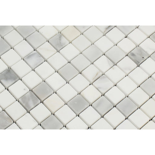 Close-up of Calacatta Marble 1x1 mosaic showing polished veining detail