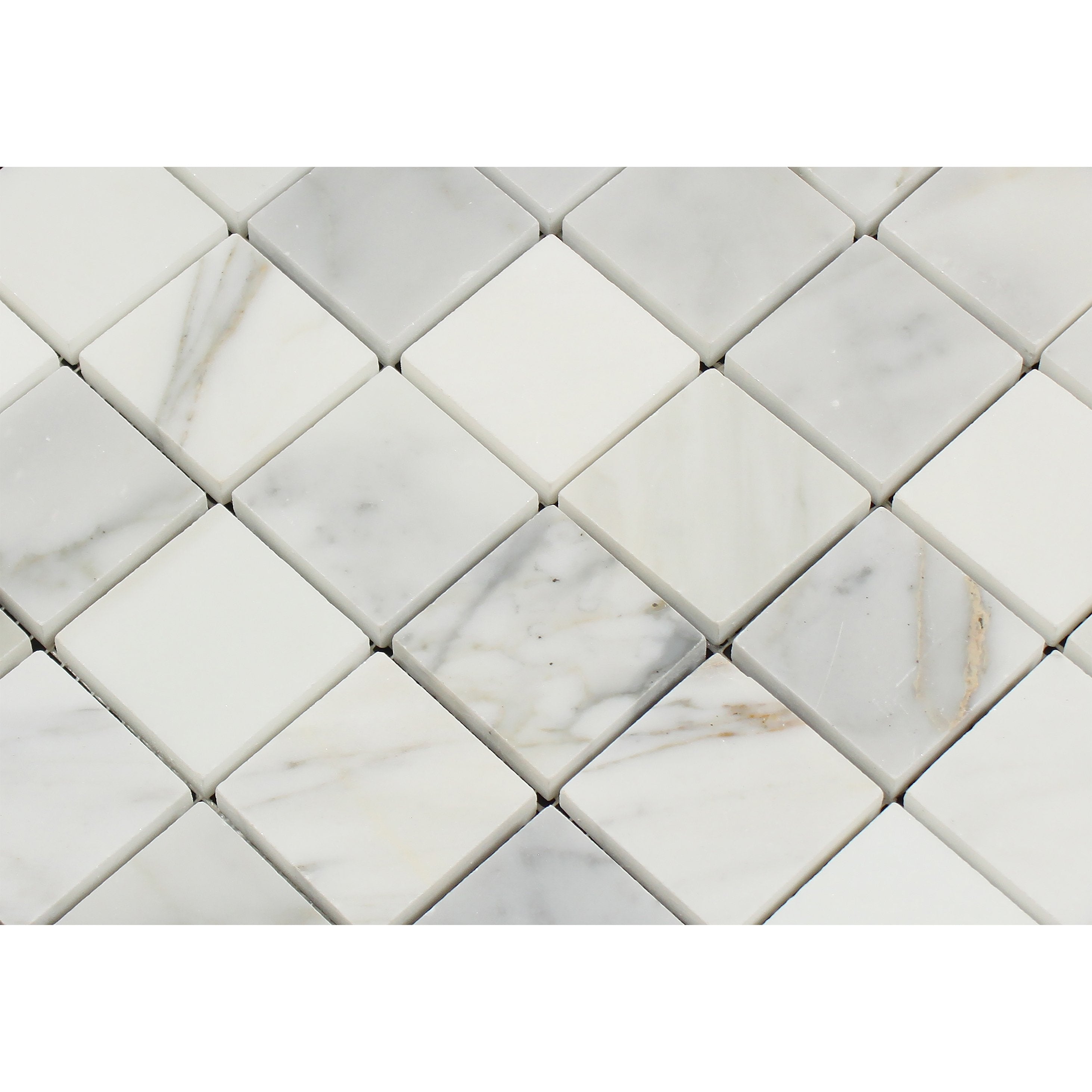 Close-up of Calacatta Marble mosaic tile showing detailed veining and polished surface