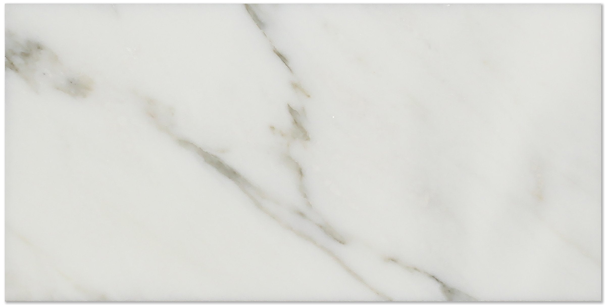 Close-up of Calacatta Marble 3x6 subway tile showing veining details