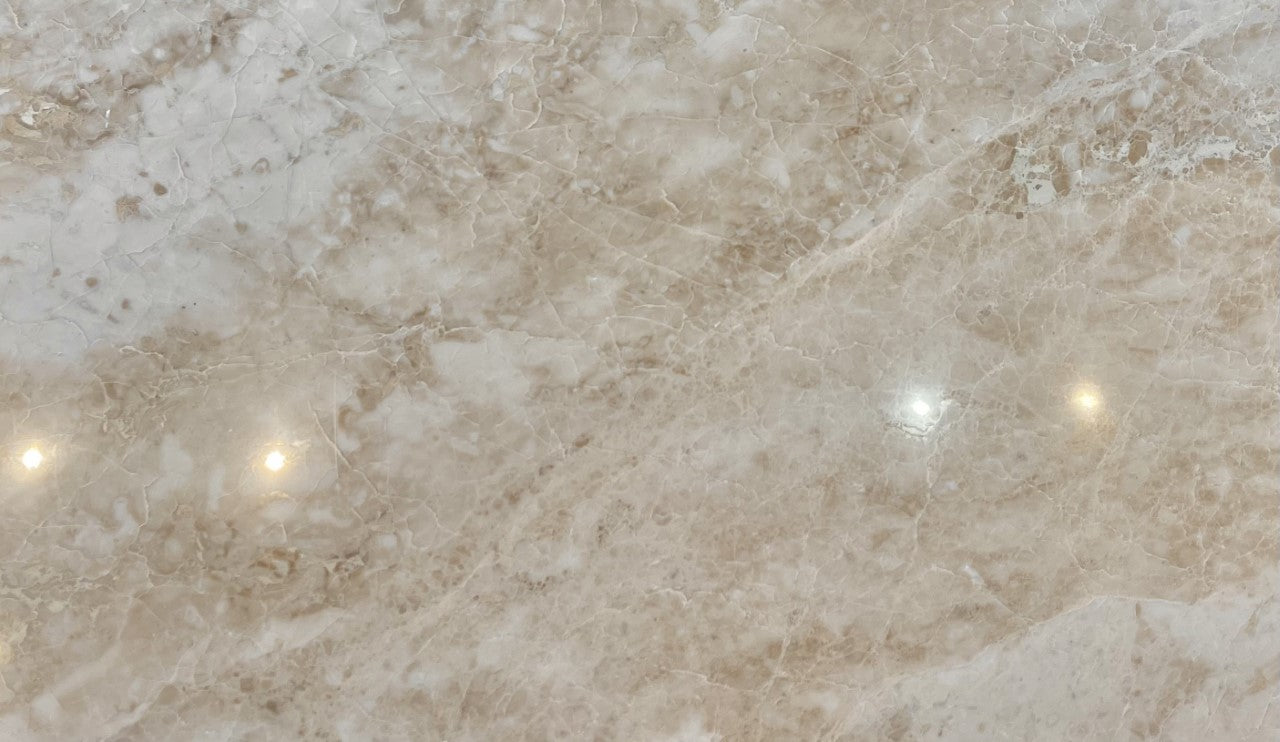 Flat view of Cappuccino Marble 12x24 tile showing polished finish and warm tonal variation