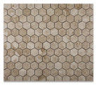 Close-up of Cappuccino marble hexagon mosaic showing polished texture and warm tones