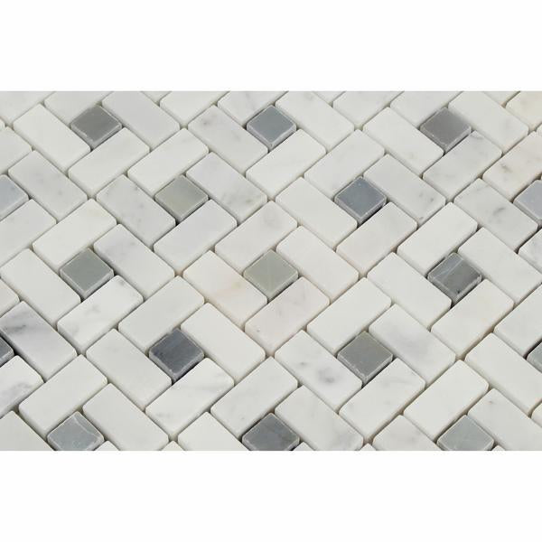 Detail of Carrara pinwheel mosaic tile featuring polished blue inserts