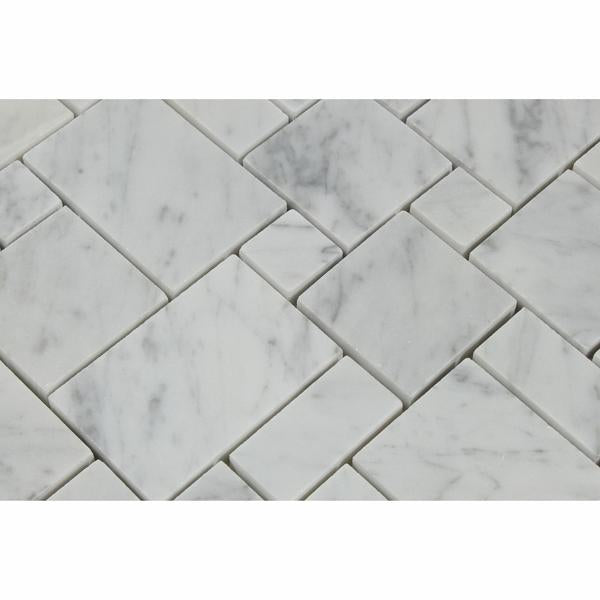 Close-up view of Carrara White marble mosaic showing soft gray veining