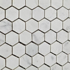 Close-up of Carrara White Marble Hexagon Mosaic showing polished finish and soft veining