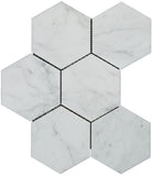 Flat lay of Carrara White 5-inch hexagon marble tile with polished finish