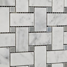 Close-up of basketweave pattern featuring Carrara white strips and blue dot accents in polished marble