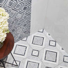 Carrara White Fiorentina Mosaic installed on a floor for a luxurious European look