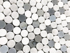 Close-up of Carrara White Penny Round Mosaic showing circular marble tiles and light veining