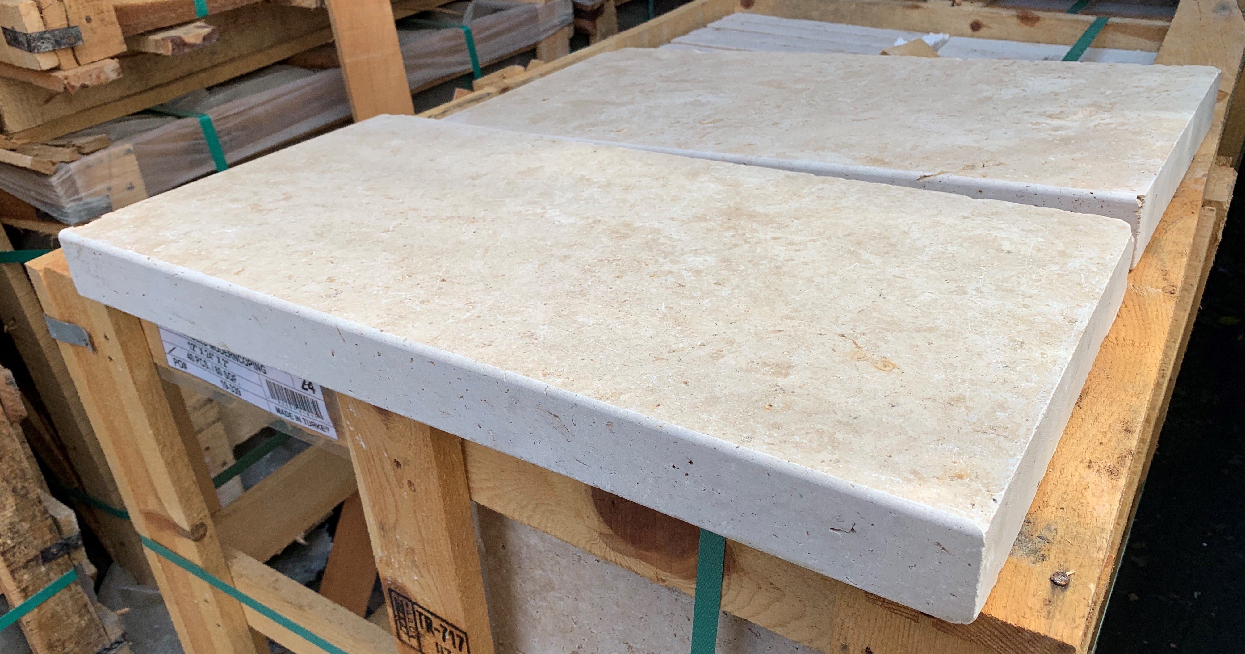 Close-up of Cordoba Cream Travertine showing soft beige tones and clean edge