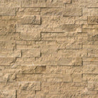 Flat lay of Cordoba Noche travertine stacked panel in rustic brown tones