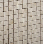 Close-up of Crema Marfil polished 5/8 inch mosaic with reflective finish
