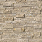 Flat lay of Durango Cream split face travertine panel in warm beige tones
