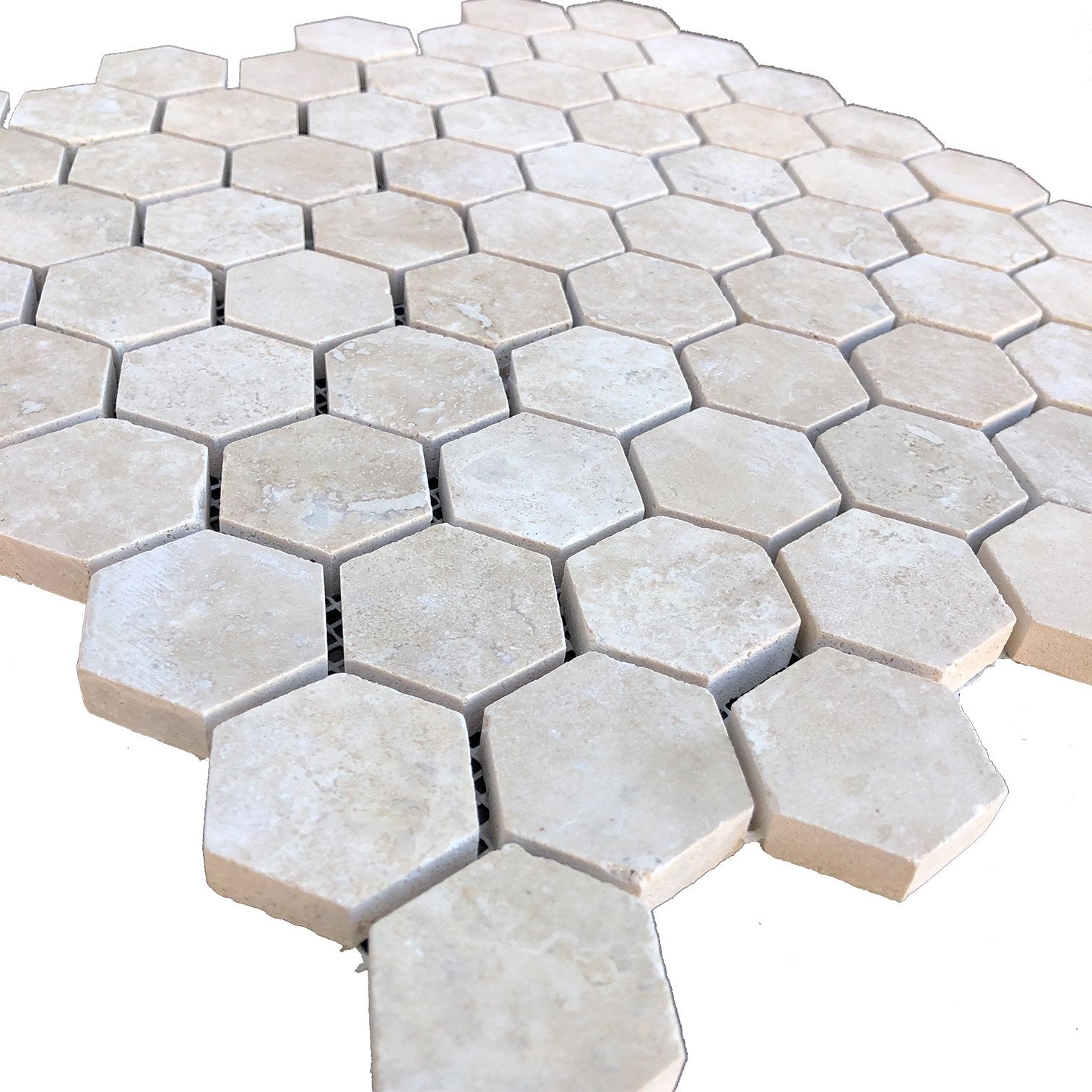 Close-up of Durango 2" hexagon tile showing honed texture and creamy tones
