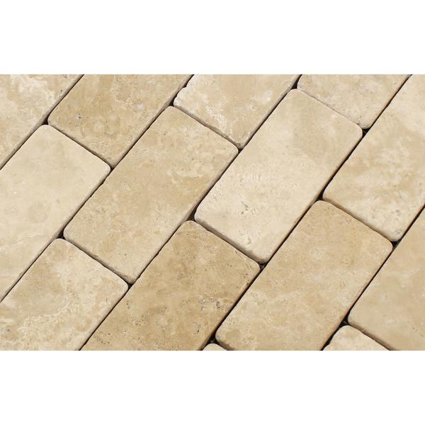 Close-up of Durango 2x4 tiles showing soft tumbled edges and natural color variation