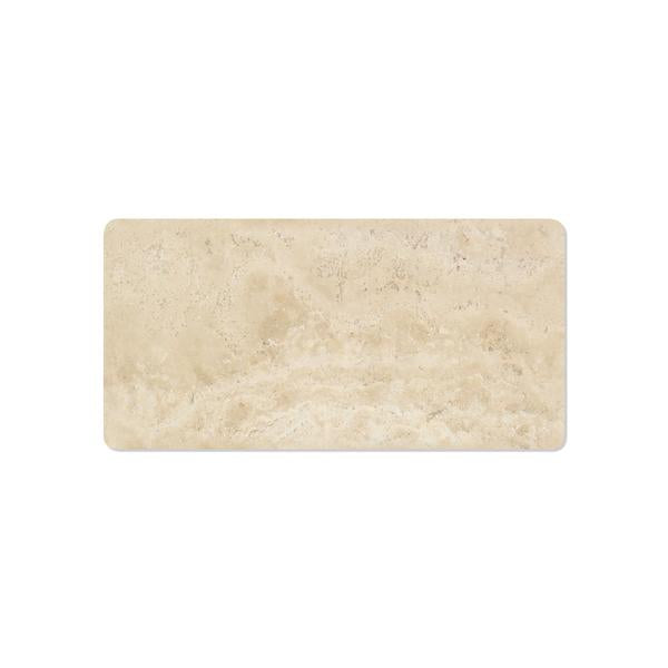 Close-up of Durango Travertine 3x6 showing tumbled texture and veining