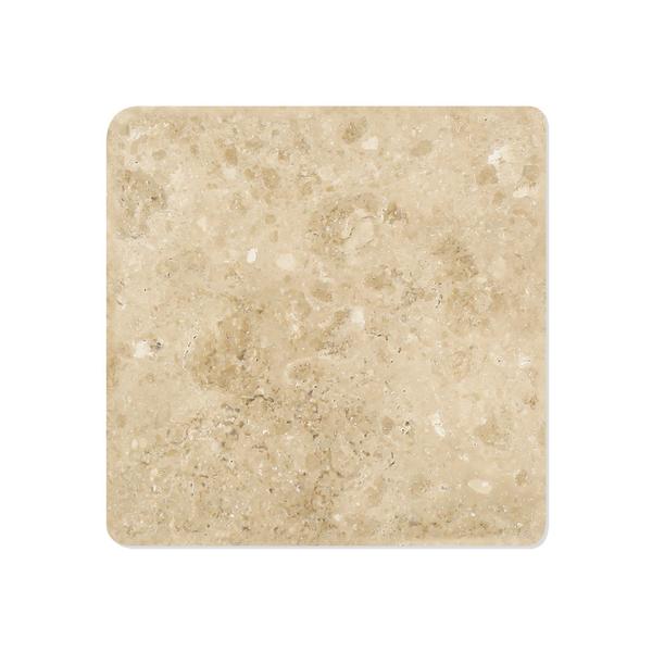 Close-up of tumbled texture and edge of Durango 4x4 travertine tile