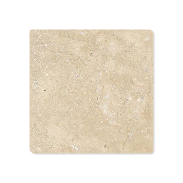 Close-up of tumbled texture and edge of Durango 4x4 travertine tile
