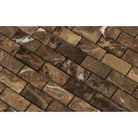 Close-up of Emperador Dark marble 1x2 mosaic showing tumbled surface