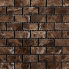 Close-up of Emperador Dark marble in 5/8x1 1/4 baby brick pattern