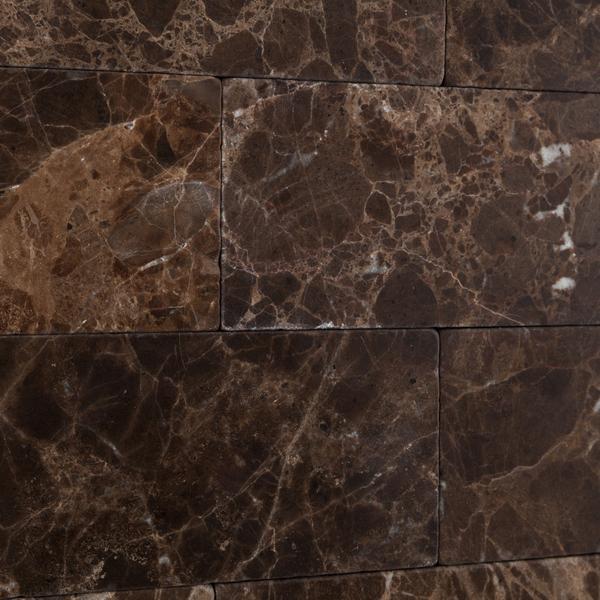 Emperador Dark subway tile showing tumbled edges