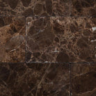 Close-up of Emperador Dark subway tile showing tumbled edges