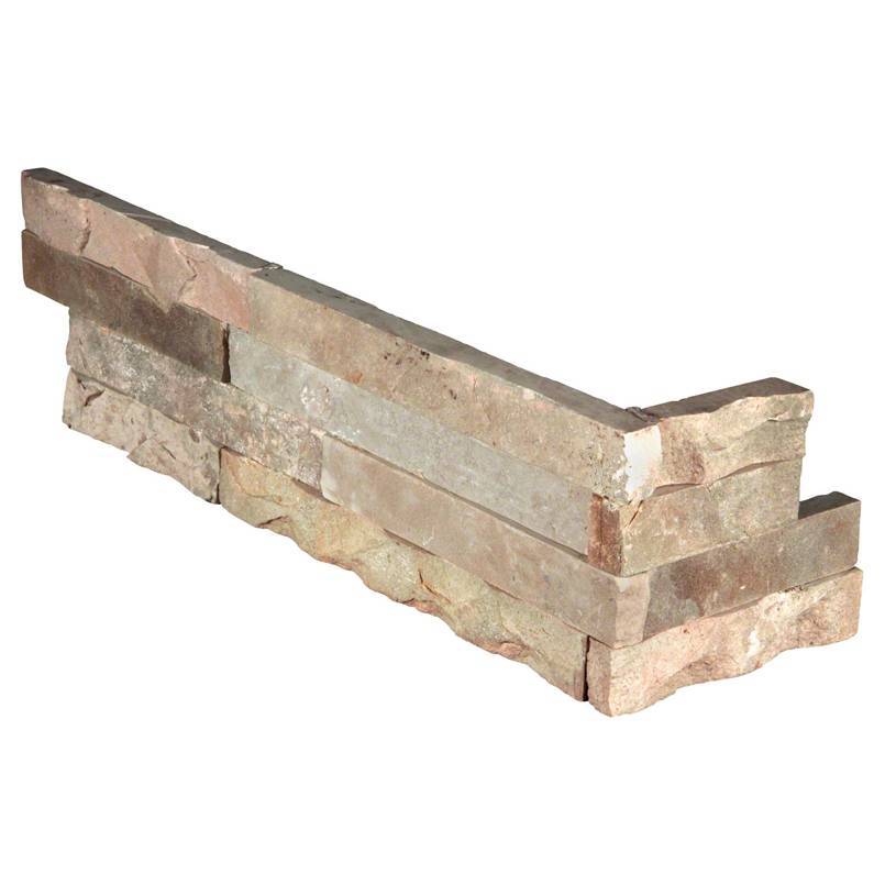 Flat lay of Fossil Rustic sandstone corner panels showing warm gray and rust tones