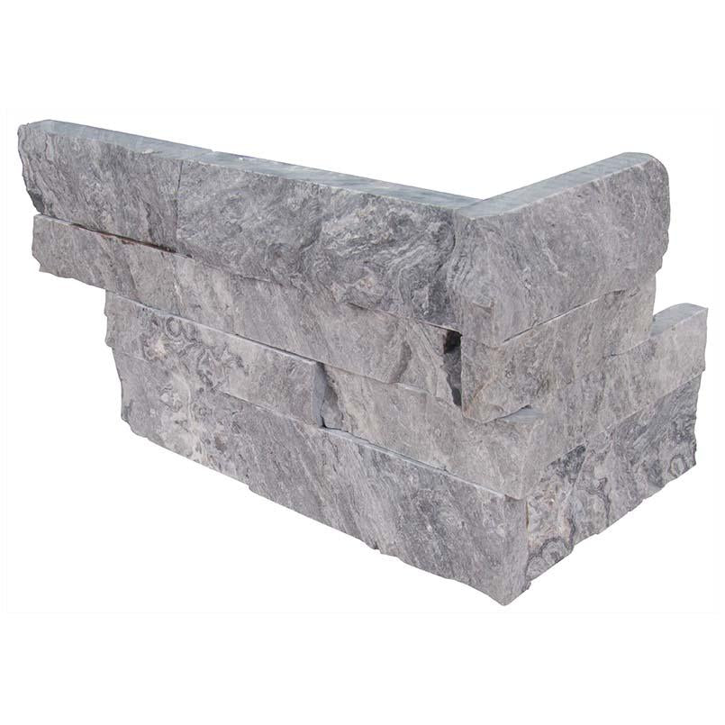 Flat lay of Glacial Gray marble corner panels in cool soft gray tones