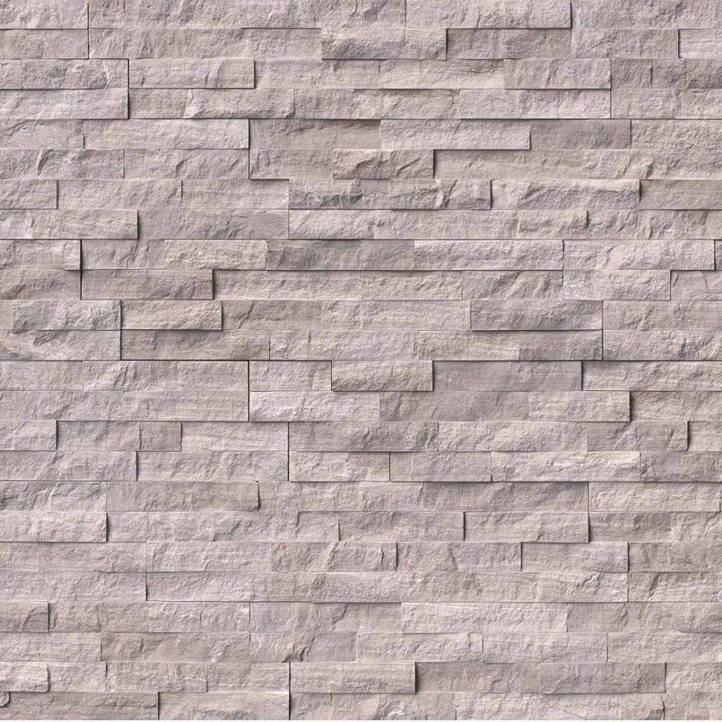 Flat lay of Gray Oak splitface marble stacked stone panel in neutral gray tones