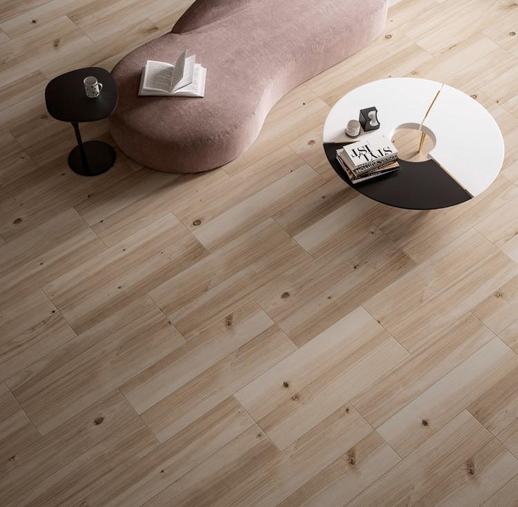 Close-up of Havenwood Beige tile showing realistic woodgrain texture and darker knot accents