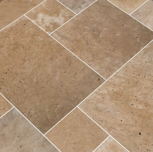 Close-up of Hazelnut Travertine showing tumbled finish and color texture

