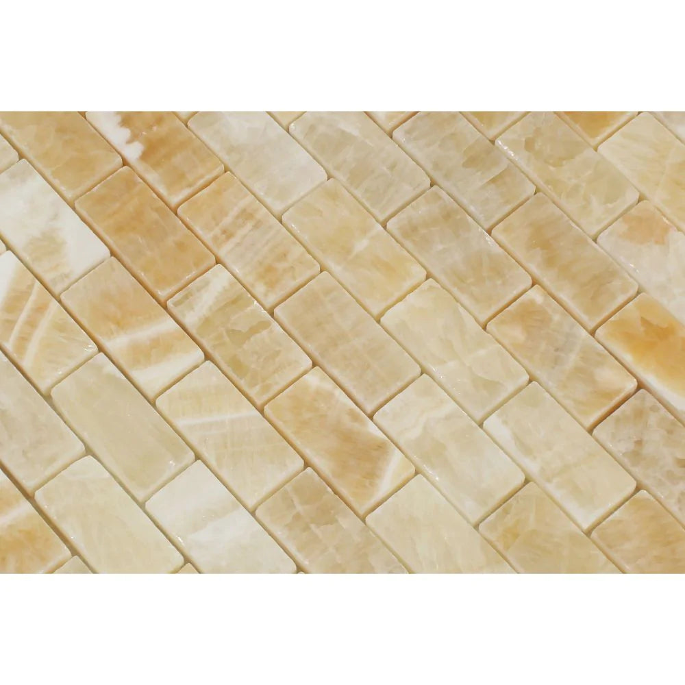 Close-up of Honey Onyx 1x2 Mosaic showing polished surface and amber veining