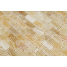 Close-up of 5/8x1 polished Honey Onyx mosaic showing fine detail and golden veining