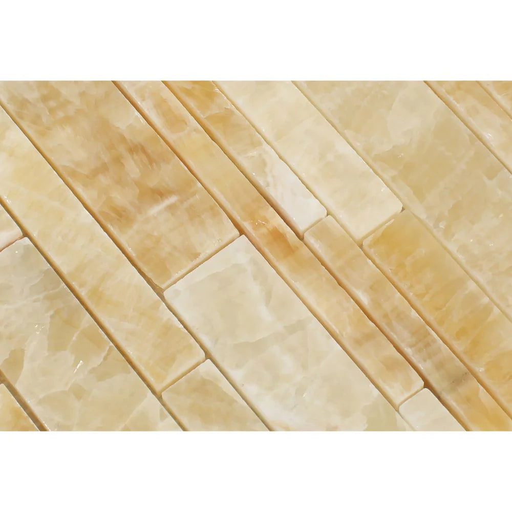 Close-up of Honey Onyx Random Strip Mosaic showing natural golden veining and linear layout