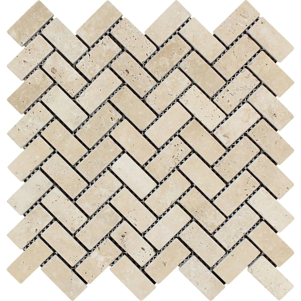 Flat view of Ivory Travertine 1x2 Tumbled Herringbone Mosaic on 12x12 mesh