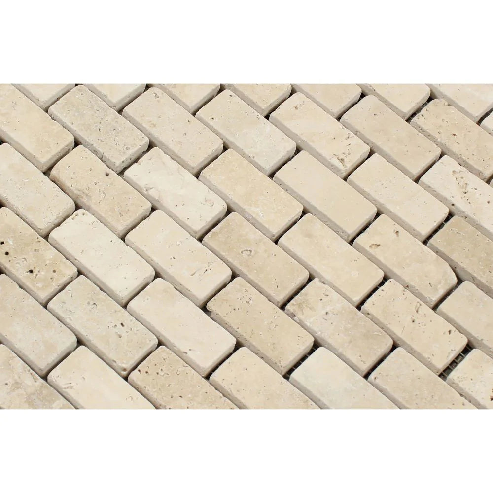 Close-up of Ivory Travertine 1x2 Mosaic showing natural color variation and texture