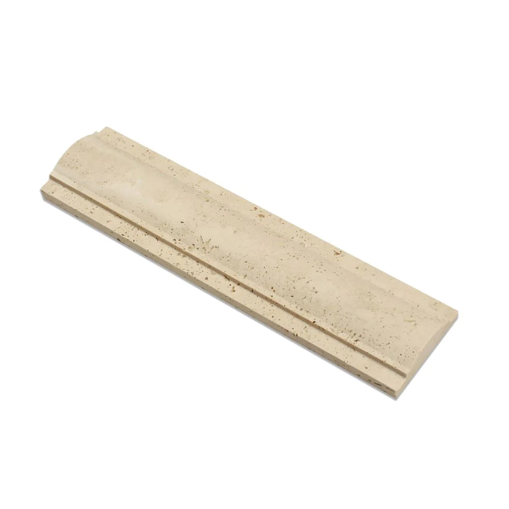Close-up of Ivory Travertine Arch Molding showing smooth arch profile