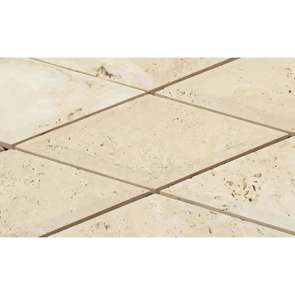 Close-up of Ivory Travertine 3x6 tile showing bevelled edge and smooth surface