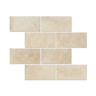 Flat view of Ivory Travertine 3x6 Honed Tile in warm tan and cream tones