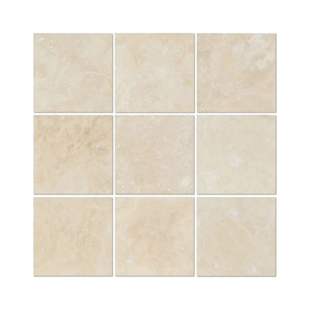 Flat view of Ivory Travertine 4x4 Honed Tile with cream and tan tones