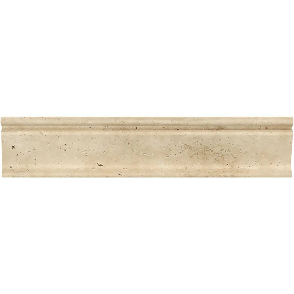Close-up of Ivory Travertine molding showing soft golden veining and profile detail