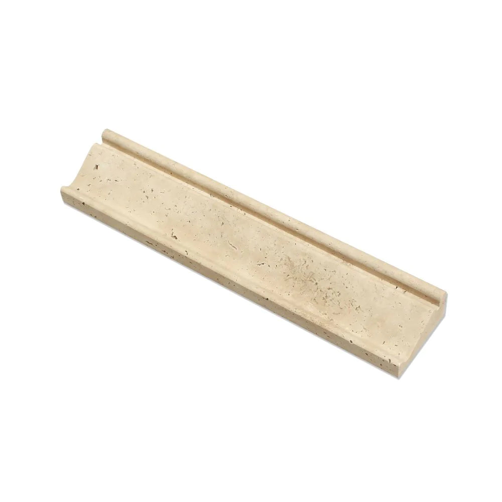 Flat view of Ivory Travertine 2 1/2x12 Crown Molding in honed finish