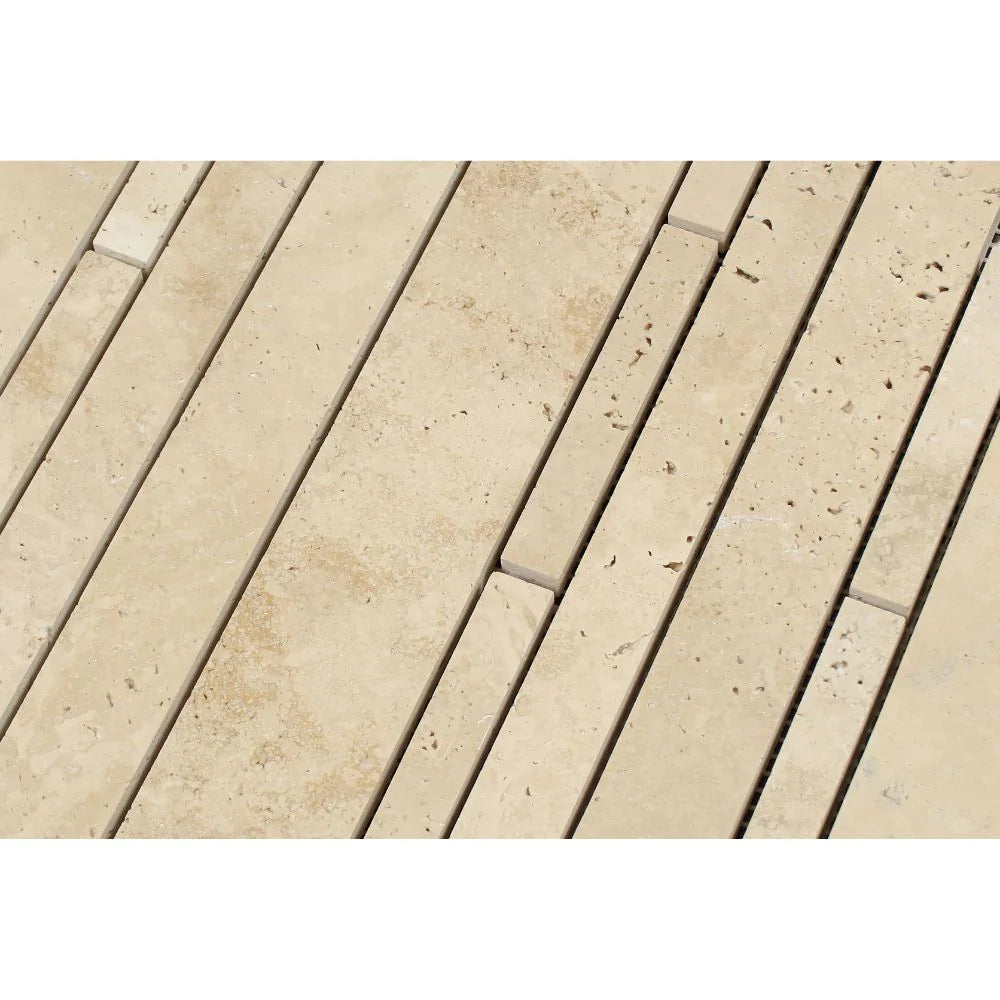 Close-up of random strip travertine mosaic showing cream and tan tones with honed finish