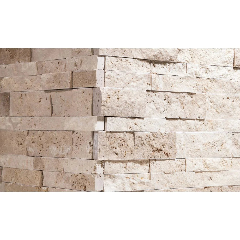 Close-up of Ivory Travertine Ledger Corner showing splitface texture and warm color variation